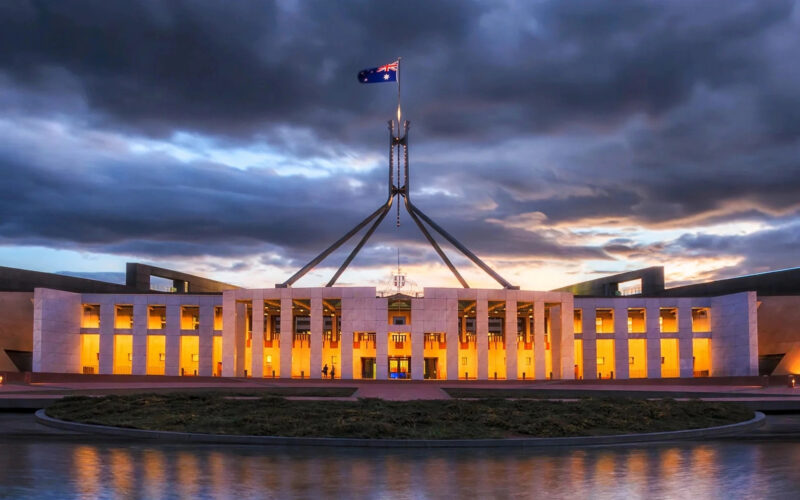 Altman Amodei Australian Senate inquiry — Australian Parliament House in Canberra at dusk
