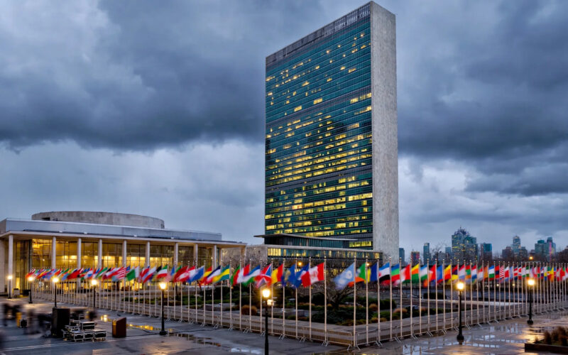 Iran Araghchi doomsday war warning — United Nations headquarters in New York at dusk
