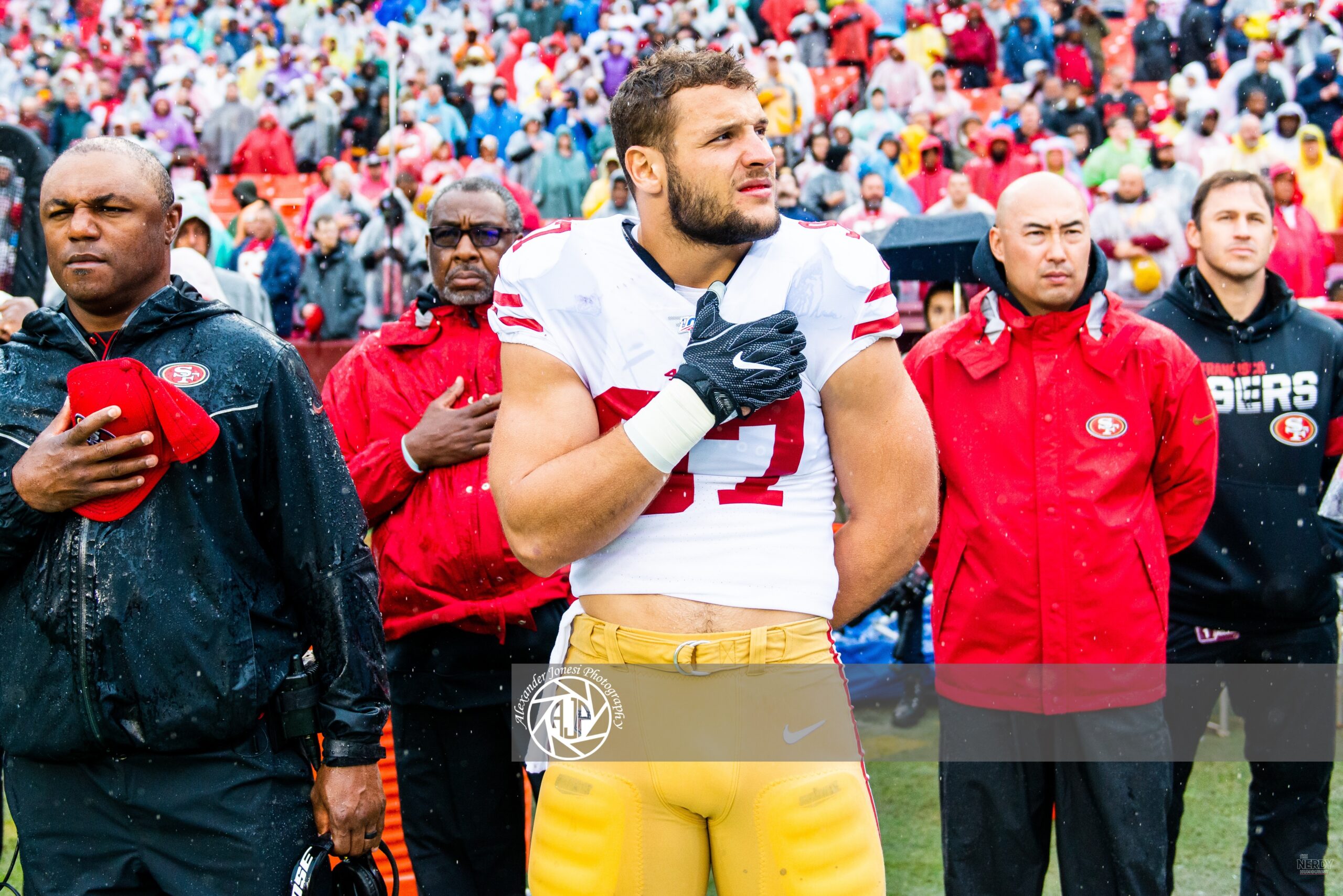 Nick Bosa on the field for the 49ers, at the center of the 49ers injury report Nick Bosa Broncos story