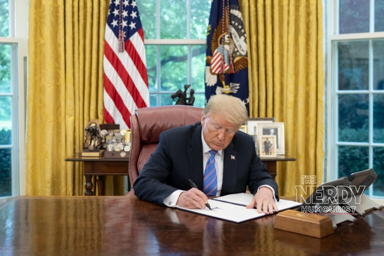 President Donald Trump signing an executive order at the Resolute Desk, illustrating the Trump Russia sanctions waiver.