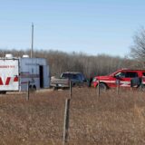 Emergency response vehicles near CFB Wainwright after the deadly Wainwright fire swept through the training area