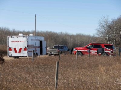 Emergency response vehicles near CFB Wainwright after the deadly Wainwright fire swept through the training area
