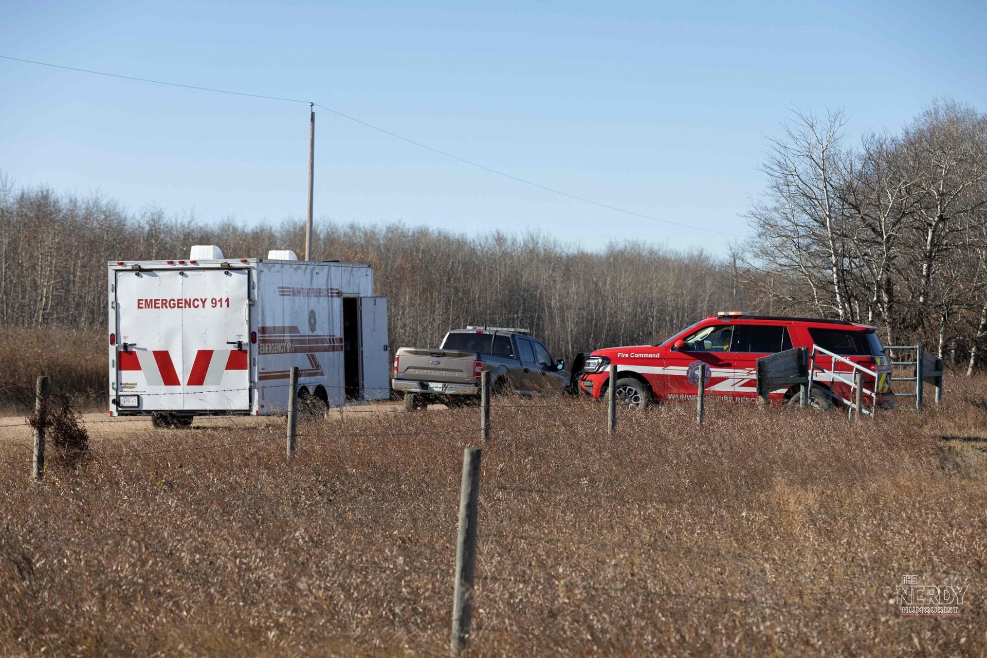 Emergency response vehicles near CFB Wainwright after the deadly Wainwright fire swept through the training area