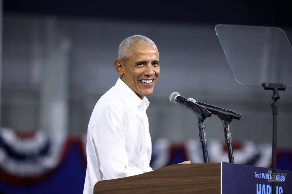 Barack Obama speaking at a campaign rally podium — Obama midterm rallies