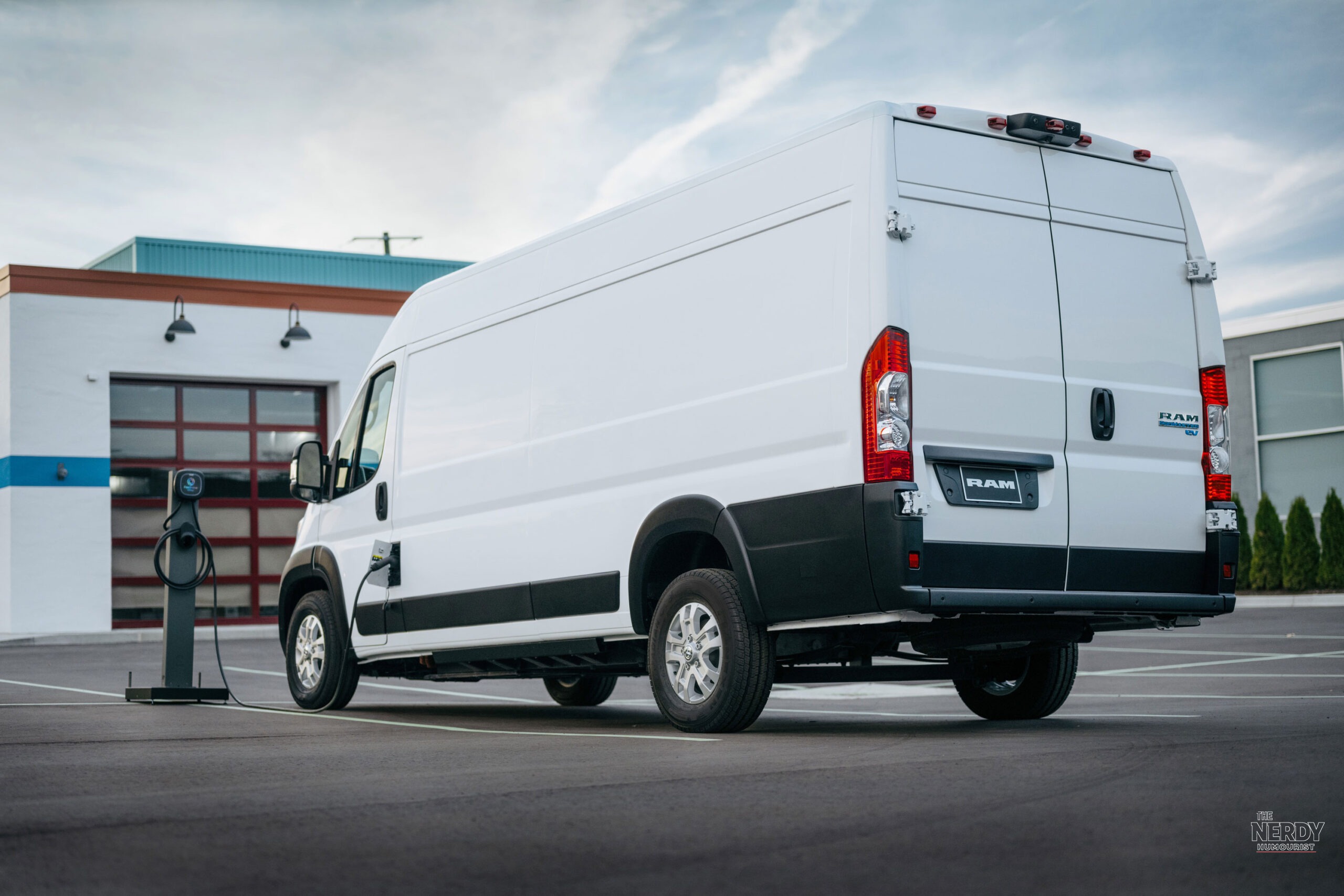Rear view of a Ram ProMaster EV charging — the Ram ProMaster recall covers electric and gas vans