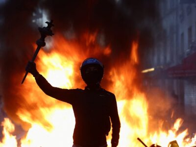 Macron Condemns “Unbridled” Violence After France Cost-of-Living Protests Erupt in Worst Unrest in Years