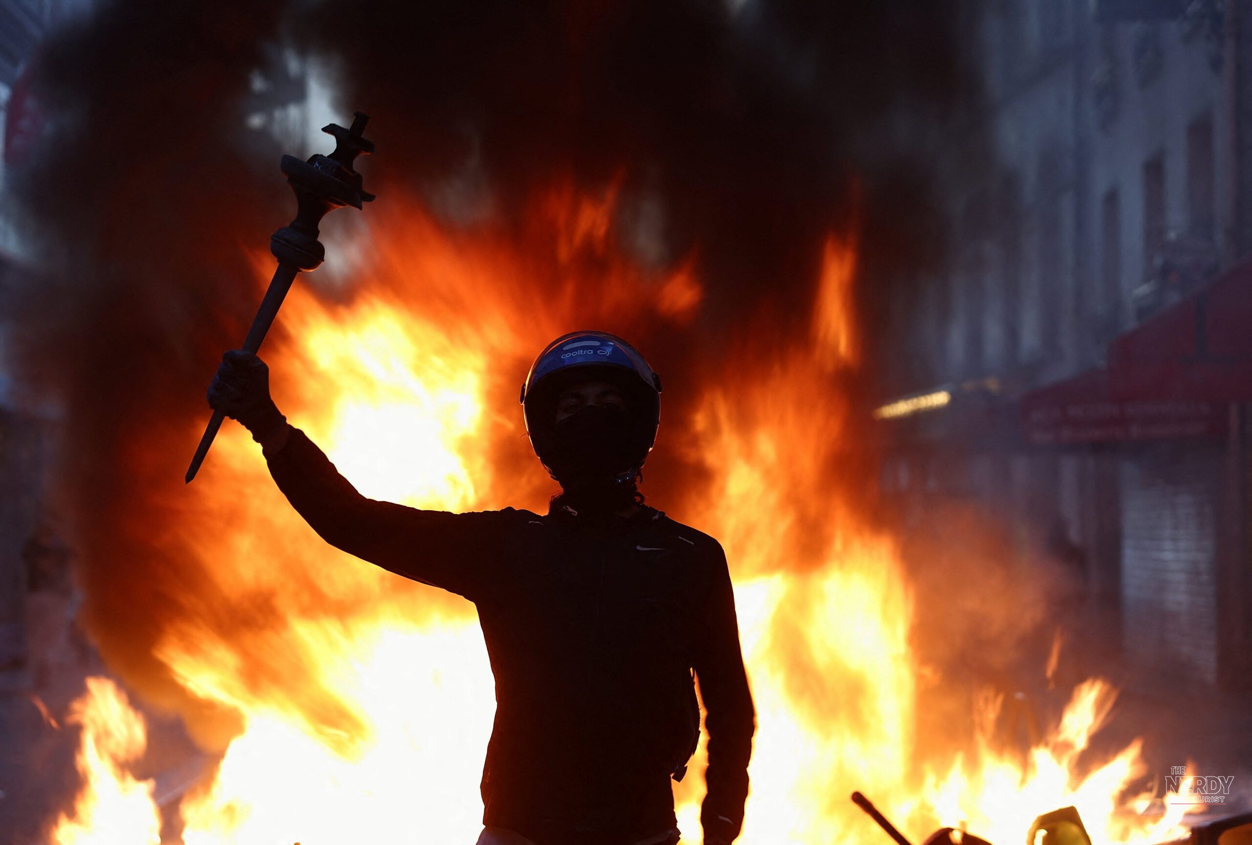 Macron Condemns “Unbridled” Violence After France Cost-of-Living Protests Erupt in Worst Unrest in Years