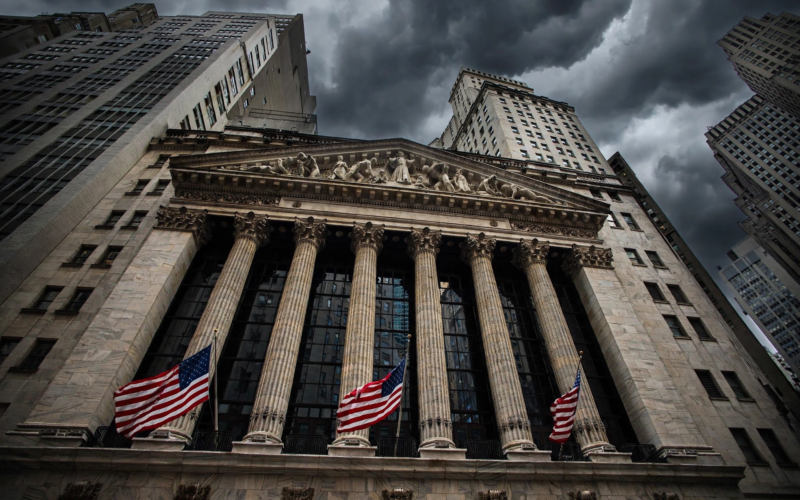 New York Stock Exchange facade with American flag during Accenture earnings stock surge