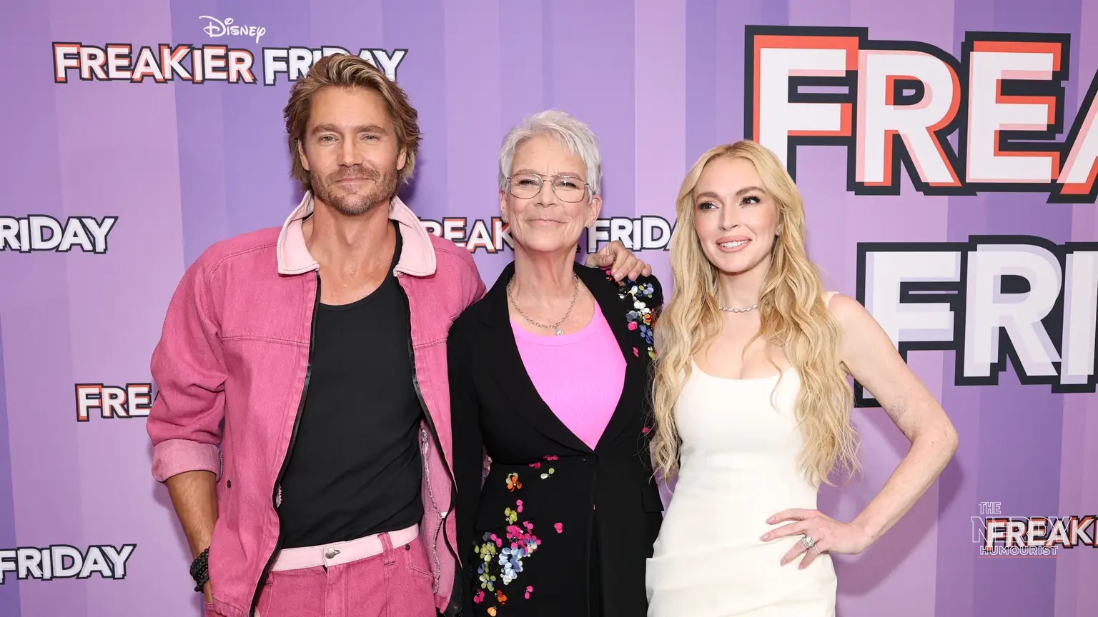 Lindsay Lohan poses at a red-carpet event; she marked Lindsay Lohan Mean Girls Day by recreating the iconic October 3 Mean Girls scene with director Mark Waters