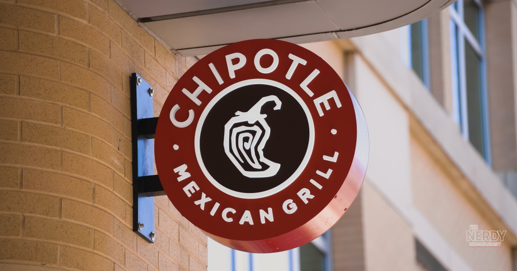 Chipotle Mexican Grill blade sign outside a restaurant — the Starbucks Chipotle takeover report is unconfirmed