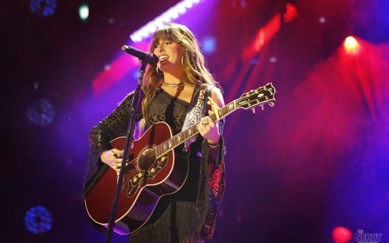 Ella Langley performing onstage with her guitar before the Ella Langley bomb threat concert cancellation in Tulsa