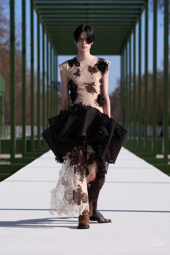 A model on the runway at Dior's Fall/Winter 2026-2027 Paris presentation, related to the Rihanna EJ Johnson Dior fashion week story