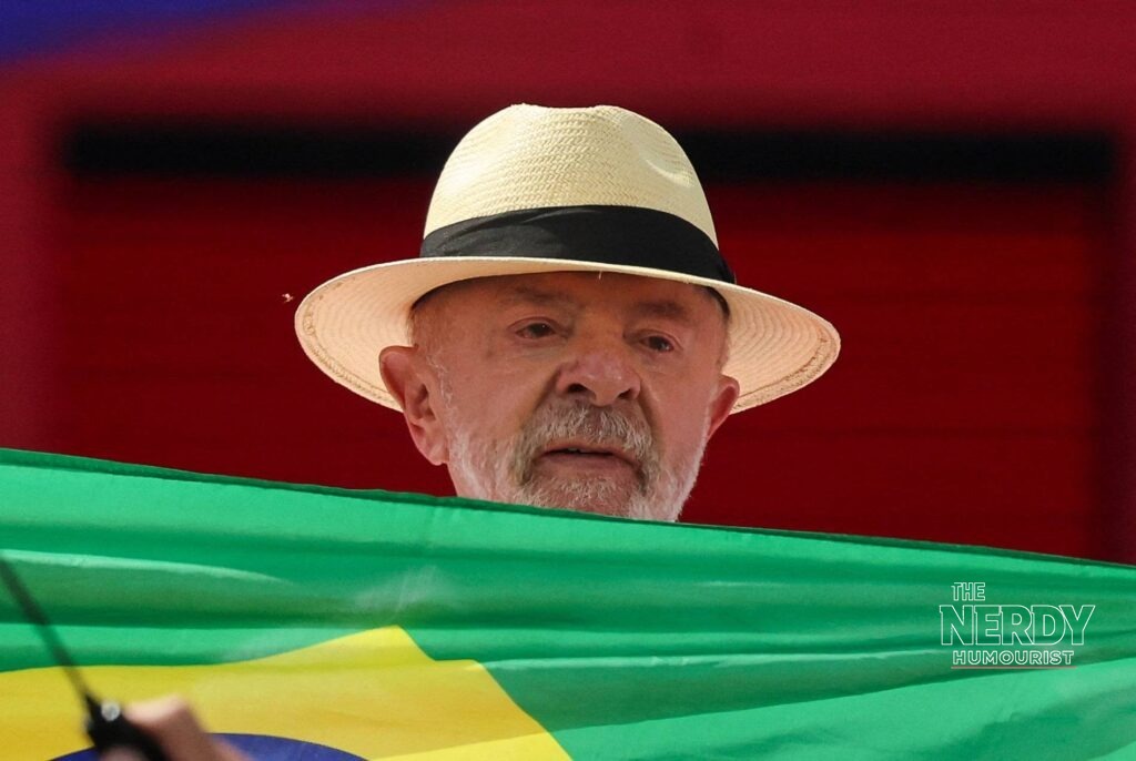 President Luiz Inácio Lula da Silva in a straw hat holding the Brazilian flag during 2026 campaign coverage, ahead of the Brazil election results runoff 2026 on October 25