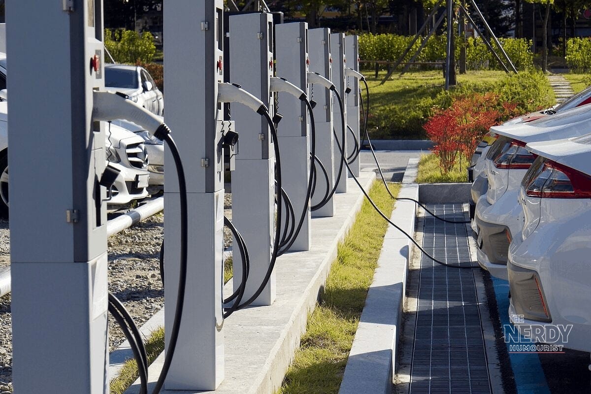 EVs plugged into charging stations, illustrating the market behind the EV models discontinued in 2026
