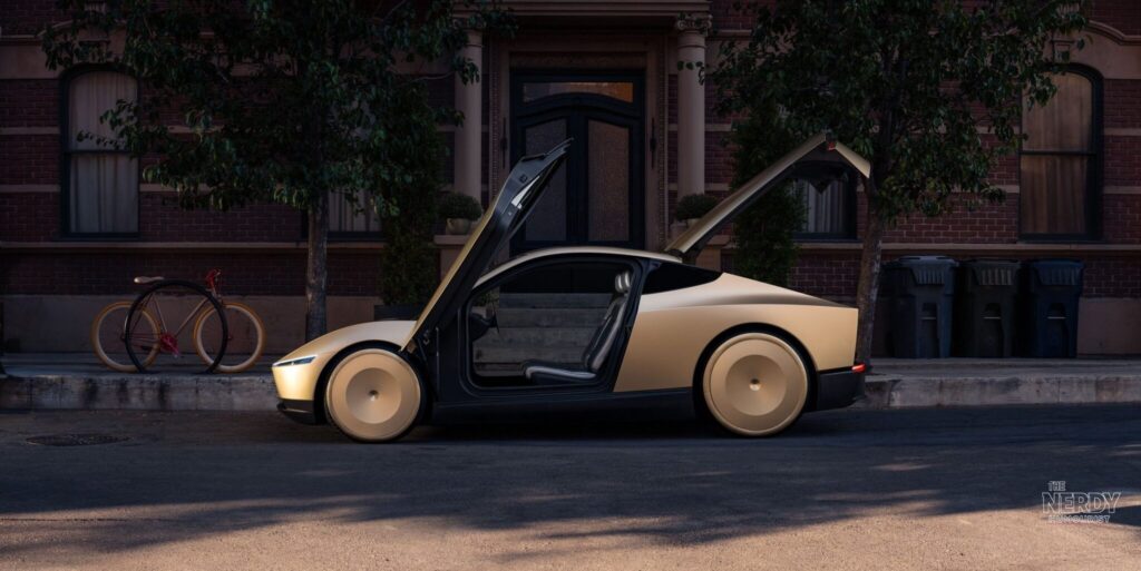 Tesla Cybercab robotaxi with butterfly doors open at launch event