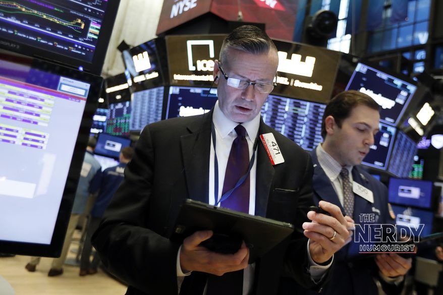 NYSE traders with market data screens during Wall Street selloff