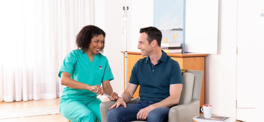 Option Care Health home infusion nurse with patient — McKesson Option Care Health deal