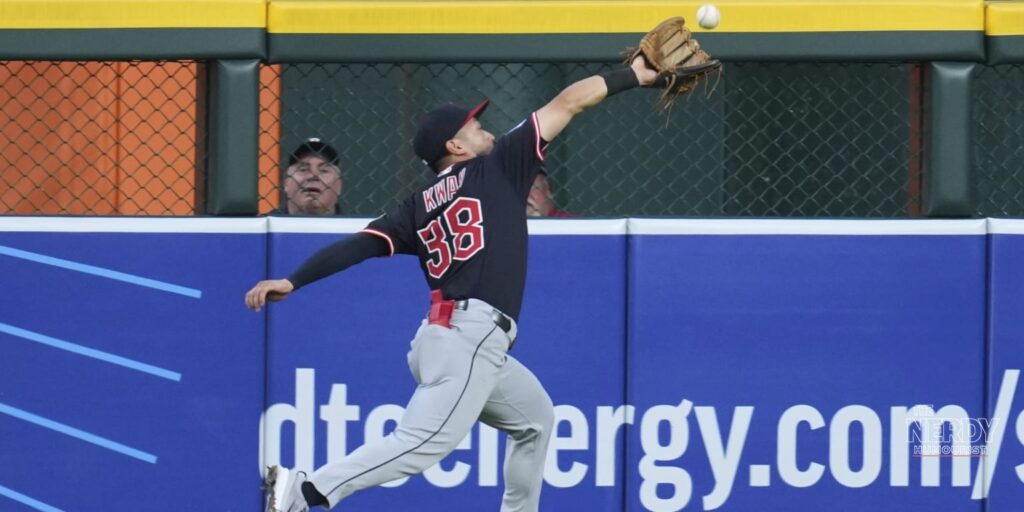 Steven Kwan of the Cleveland Guardians makes a leaping catch at the wall in the ALCS Game 5 Rays Guardians series
