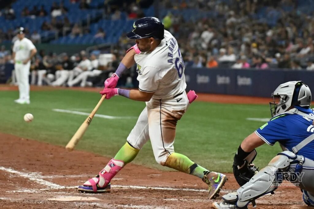 Jonathan Aranda swings for the Rays after his decisive homer in Rays Yankees ALDS Game 1
