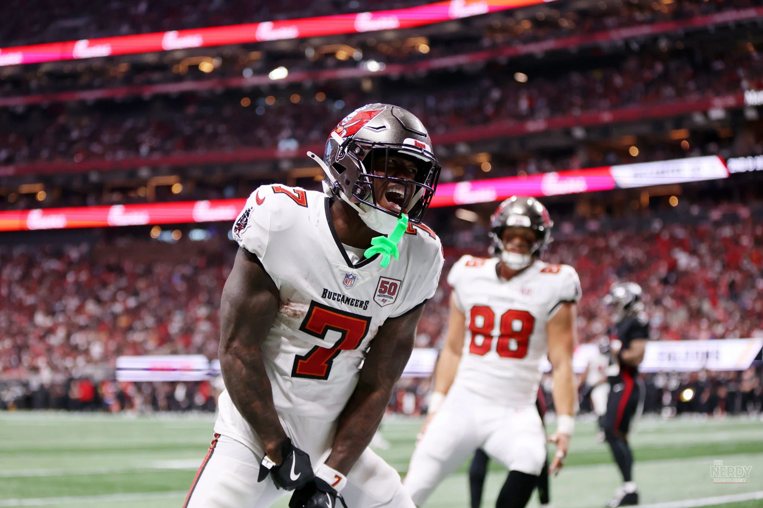 Bucky Irving celebrates after the Buccaneers beat Cowboys 24-16 on Thursday Night Football