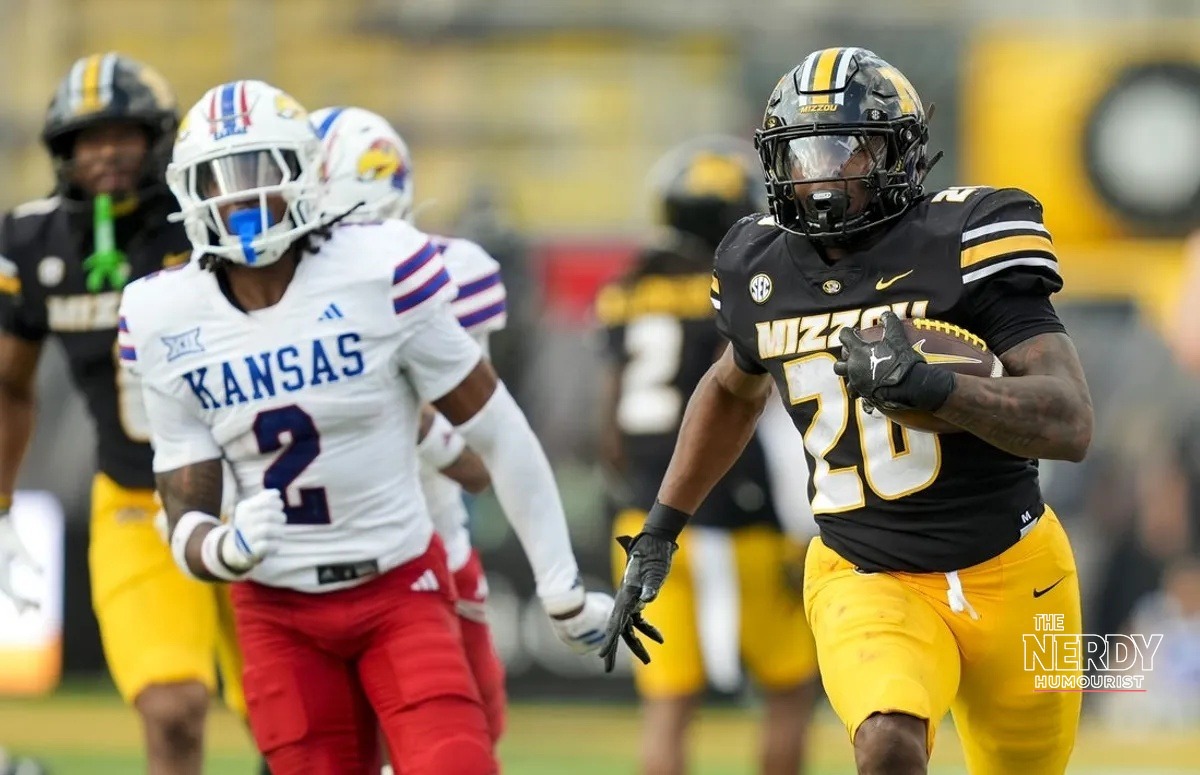 Missouri Tigers running back runs with the ball in the win behind the Missouri upsets Florida football score