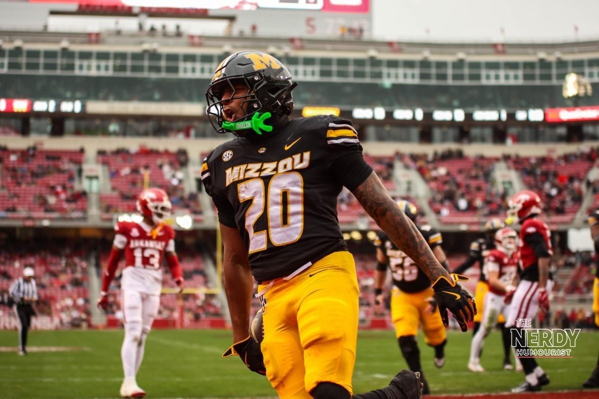 Missouri Tigers player celebrates at Memorial Stadium in Columbia after the Missouri upsets Florida football score