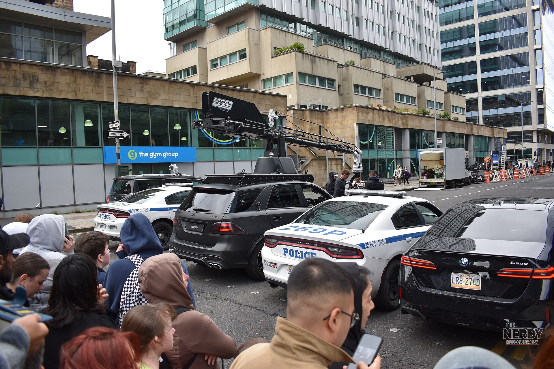 Spider-Man: Brand New Day filming in Glasgow in 2025 (file photo) — camera rig, police cars and crew on the production set —
