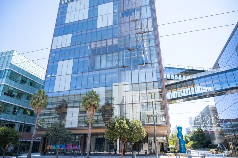Modern glass office towers associated with OpenAI as eight US states sue the company over claims ChatGPT harms children