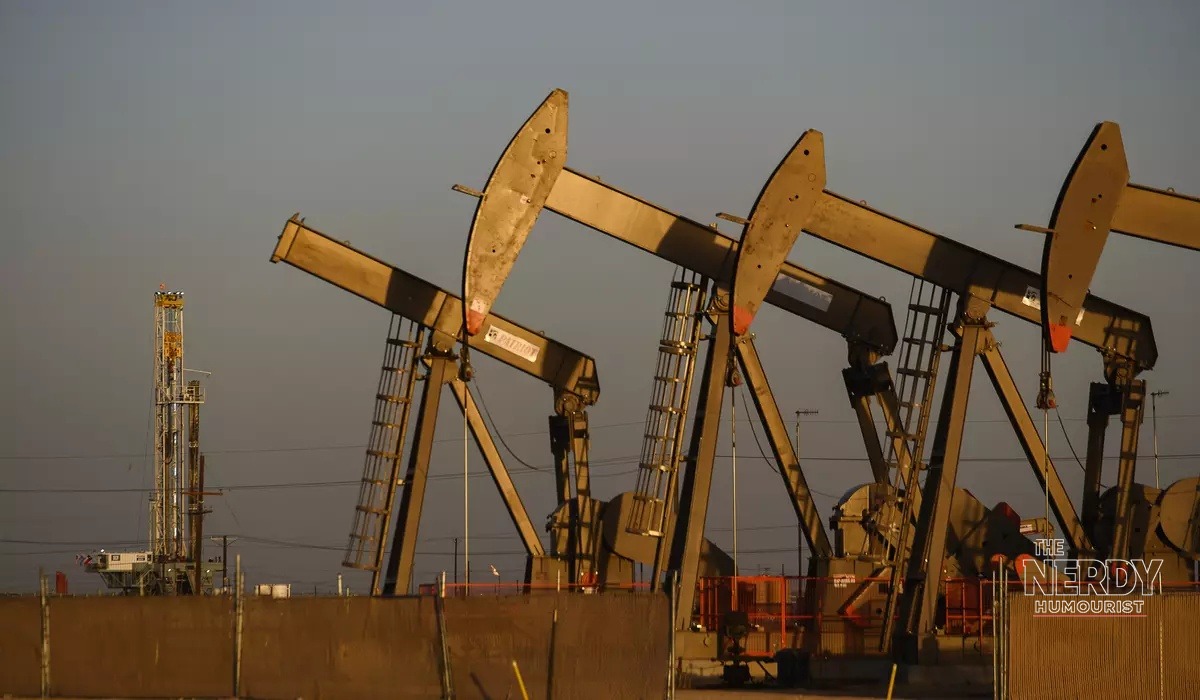 Oil pumpjacks at sunset representing ExxonMobil's upstream production segment in the ExxonMobil Q3 earnings warning