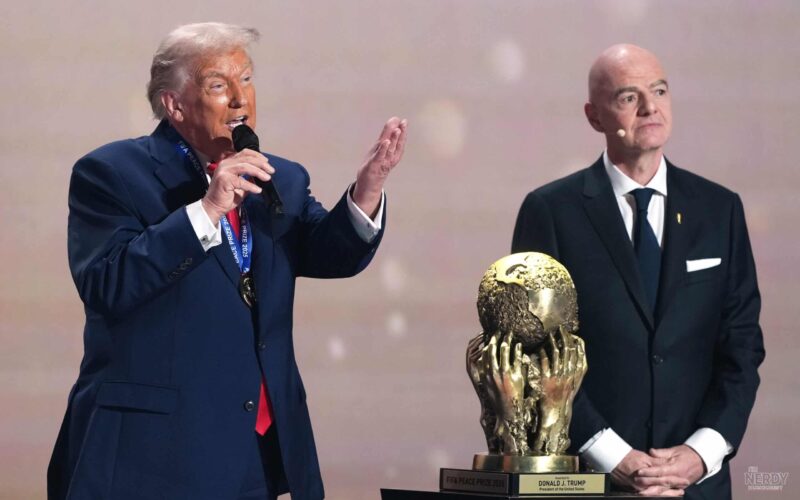Donald Trump receives the inaugural FIFA Peace Prize trophy from FIFA president Gianni Infantino at the 2026 World Cup draw in Washington, D.C., on Dec. 5, 2025