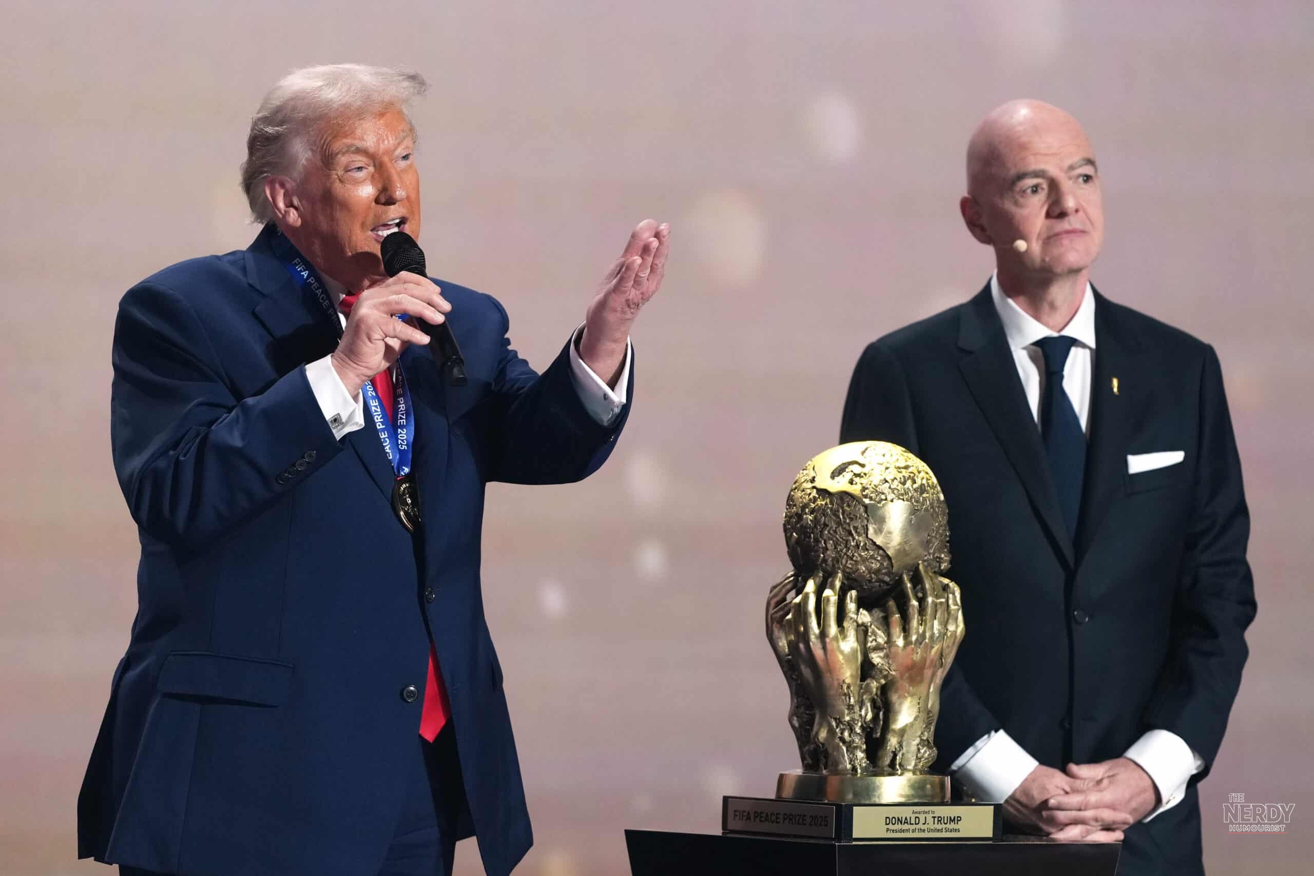 Donald Trump receives the inaugural FIFA Peace Prize trophy from FIFA president Gianni Infantino at the 2026 World Cup draw in Washington, D.C., on Dec. 5, 2025