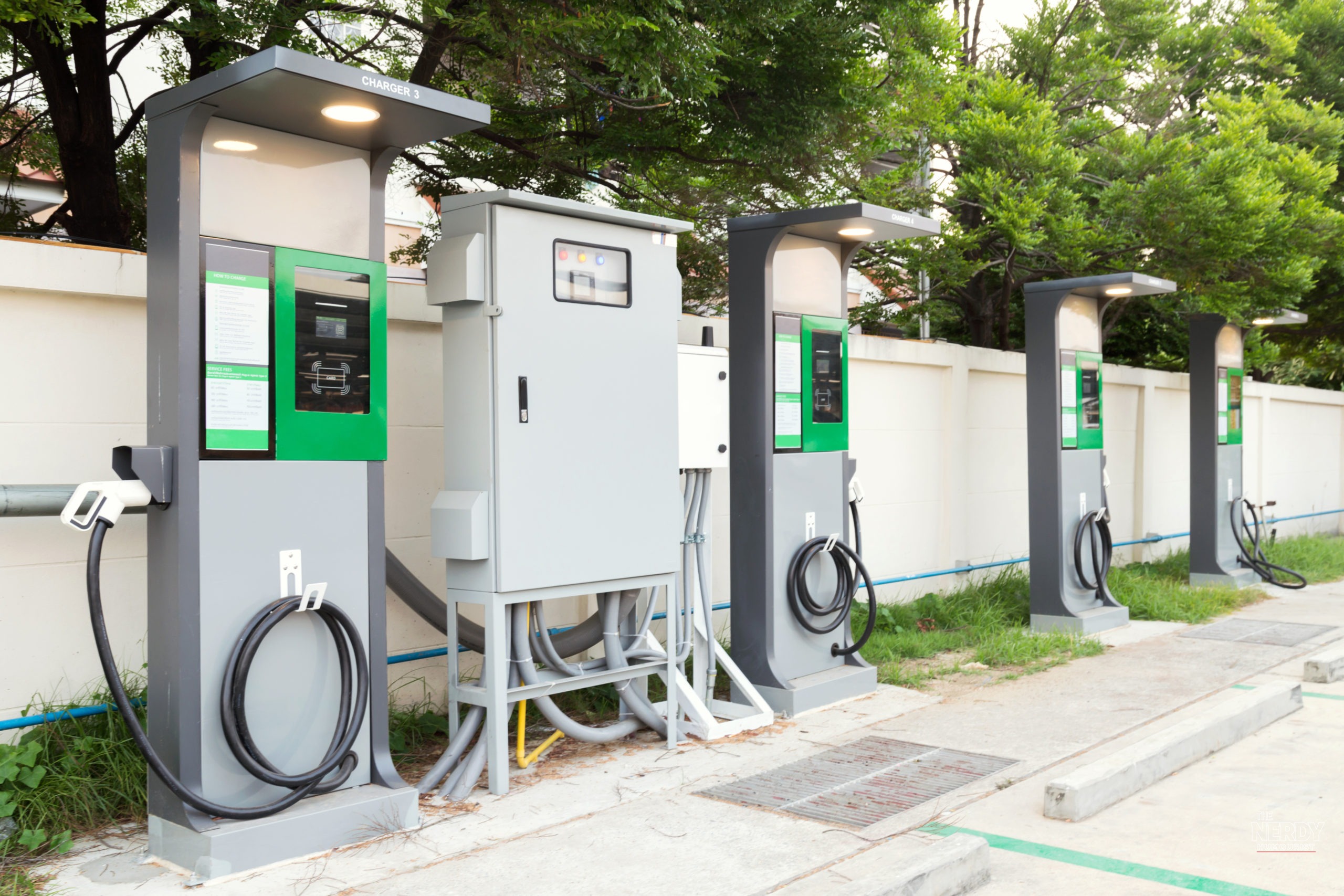 Electric vehicle charging stations as gasoline cars market share falls below 50% of global sales