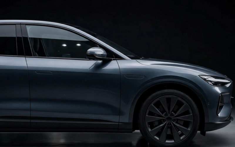 Modern luxury electric SUV side profile showing the front side window area for the Cadillac Optiq recall story