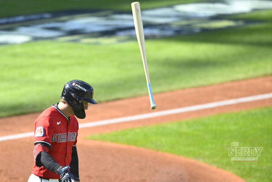 Cleveland Guardians player flips his bat during the ALCS against the Tampa Bay Rays
