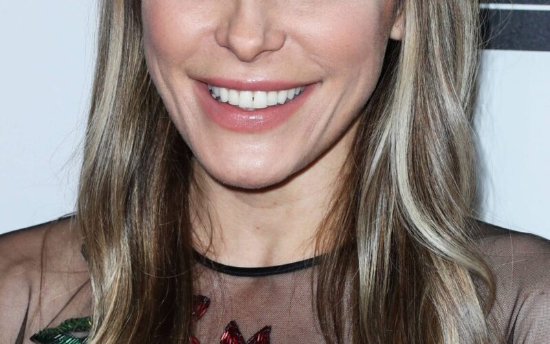 Crystal Hefner at a public event; the Crystal Hefner Jessica Biel dispute centers on the new film Playmates