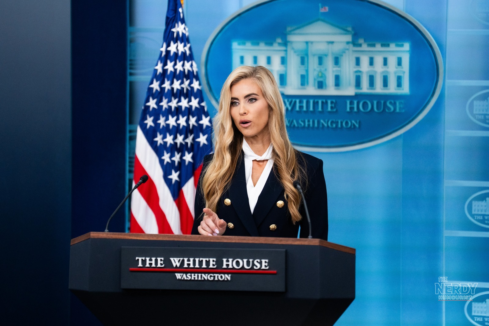 Katie Zacharia speaking from the White House briefing room podium during her short-lived tenure as press secretary