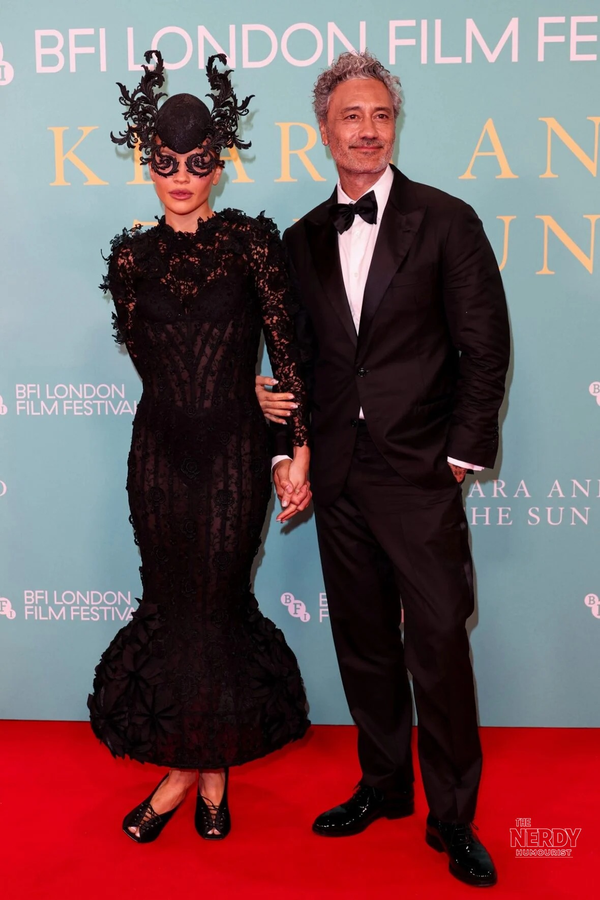 Rita Ora in a lace mask and director Taika Waititi at the Klara and the Sun premiere