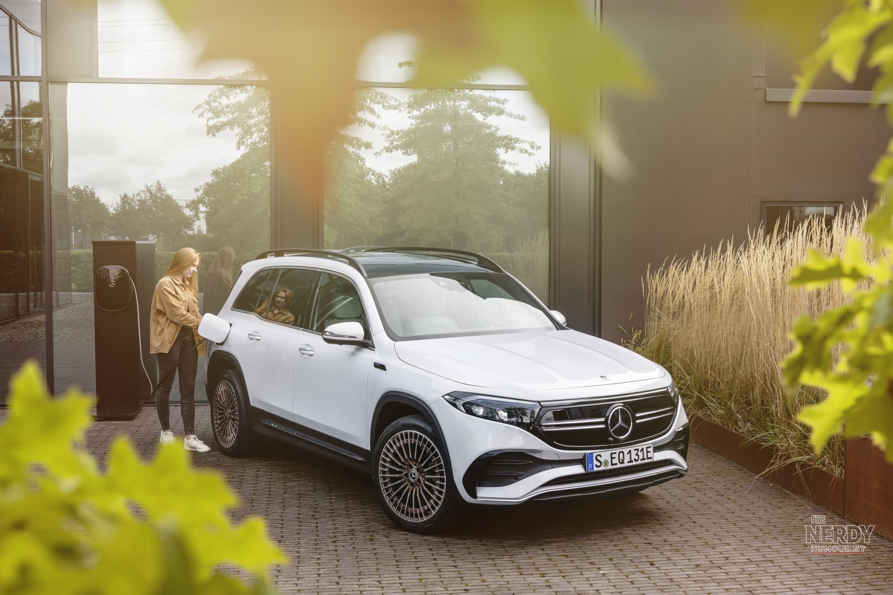 A Mercedes-Benz EQA charging at home — Mercedes-Benz Q3 sales 2026 show EVs surging 52% worldwide