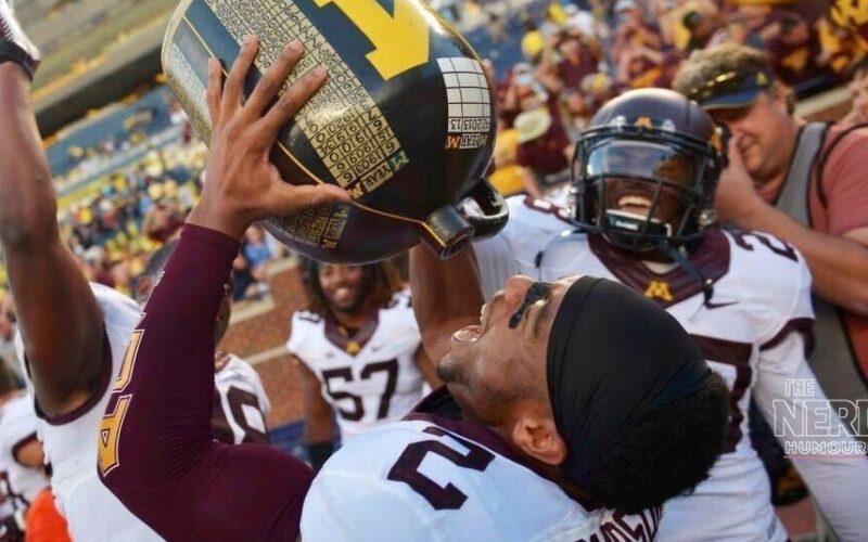 Minnesota Gophers fans celebrate the 20-14 upset win over Michigan in Minneapolis