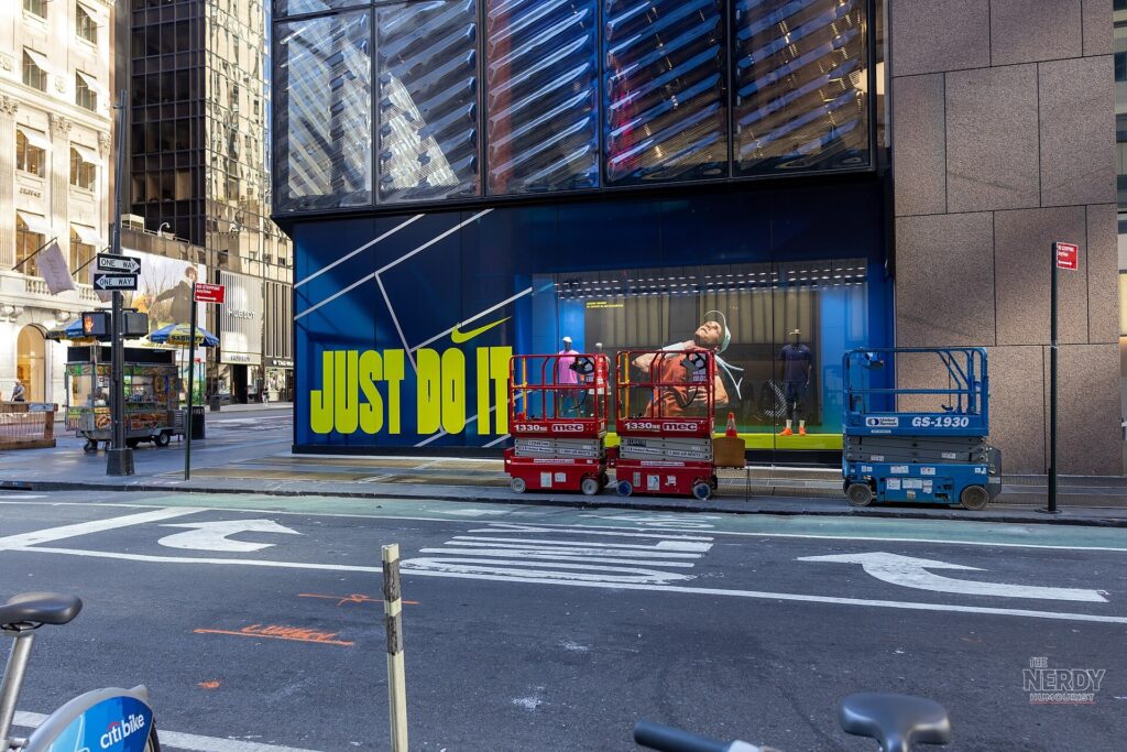 Exterior of the Nike New York City store displaying a Jannik Sinner tennis campaign, as Nike warns of a bigger sales slump and job cuts in its earnings forecast