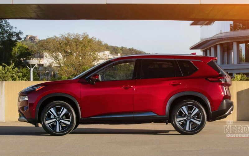Red Nissan Rogue SUV profile view for the Nissan Q3 2026 sales report