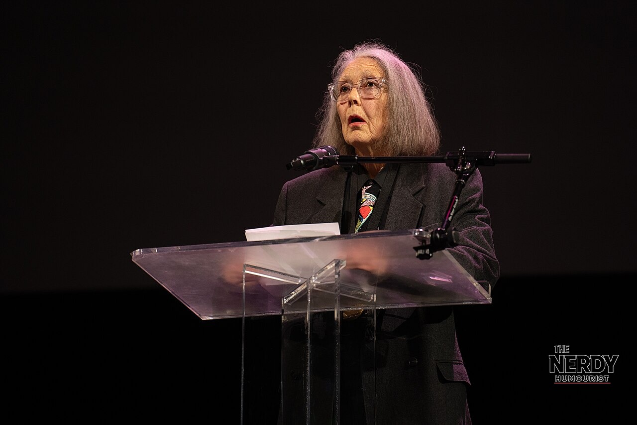 Anne Carson speaking at the 2024 National Book Awards finalist reading — the Canadian poet won the Nobel Prize Literature 2026