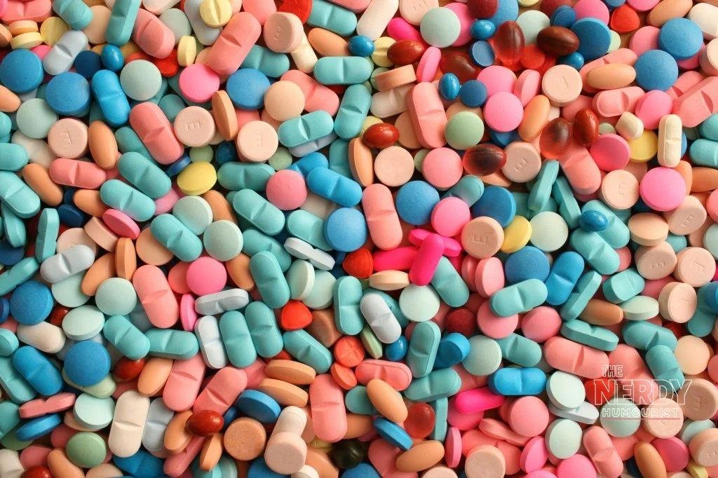 Assorted pills and tablets representing drug development, relevant to the OpenAI Orchestra Bio biotech deal