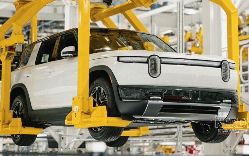 A white Rivian R2 SUV on the factory assembly line as the Rivian Volkswagen loan gives the EV maker fresh funding for production