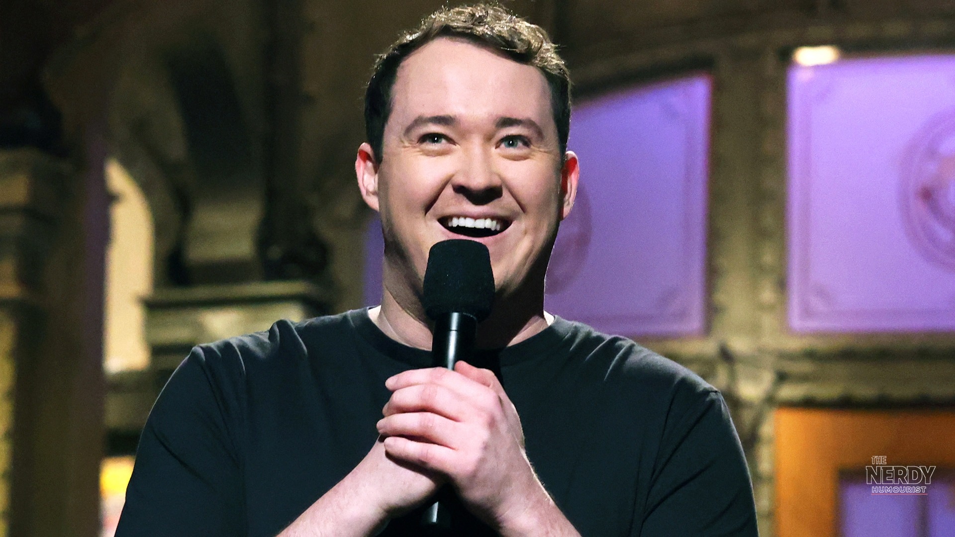 Shane Gillis performing his SNL monologue on stage during the Shane Gillis SNL monologue episode