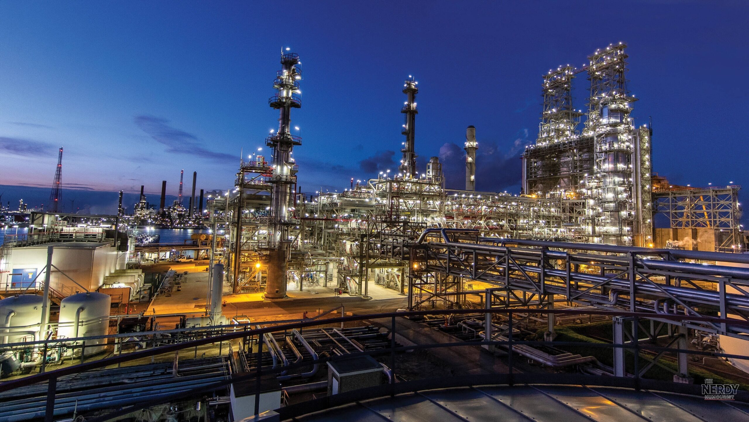An ExxonMobil refinery lit up at night, as the Supreme Court term Big Oil climate lawsuits case sees ExxonMobil and Suncor ask the justices to toss Boulder's claims