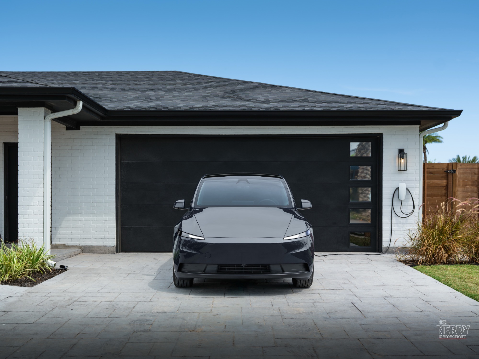 2026 Tesla Model Y charging at a home Wall Connector — Tesla Powershare home backup compatible setup