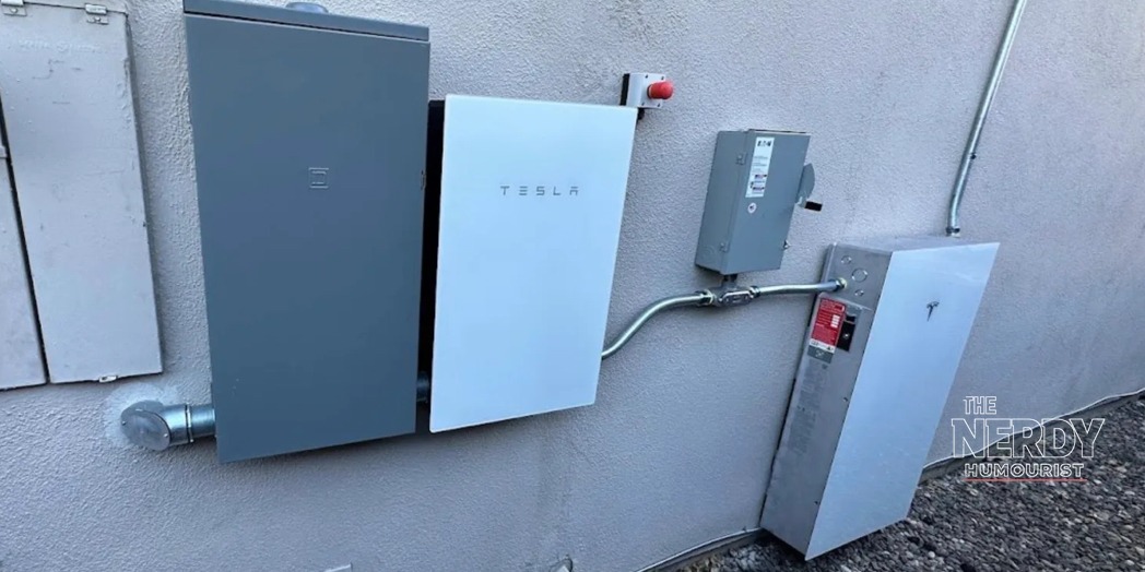 Tesla Powerwall 3 unit paired with Tesla Powershare home backup for Model 3 and Model Y