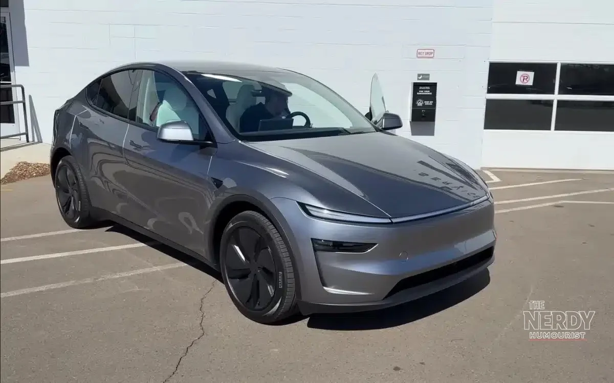 2025 Tesla Model Y at delivery — Tesla delivered 486,532 vehicles in Q3 2026