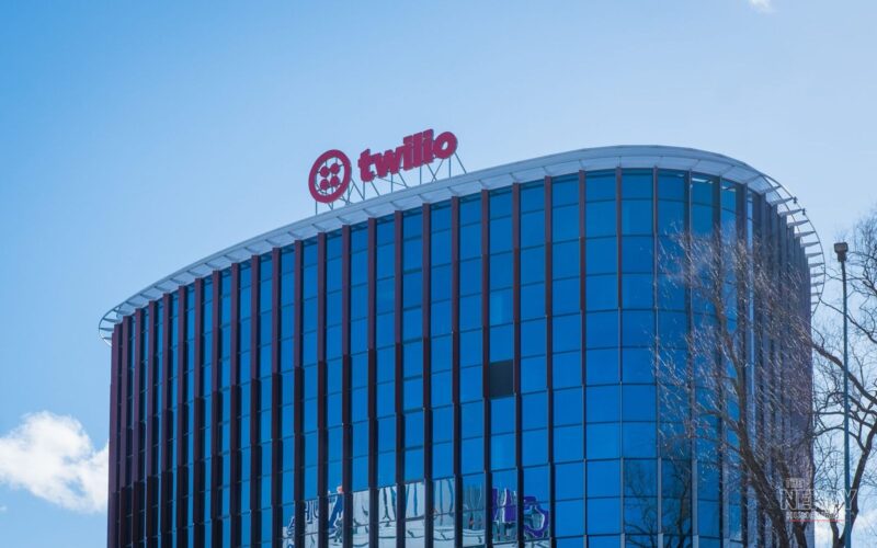 Twilio S&P 500 Warner Bros Discovery: a Twilio office building with the company's rooftop logo